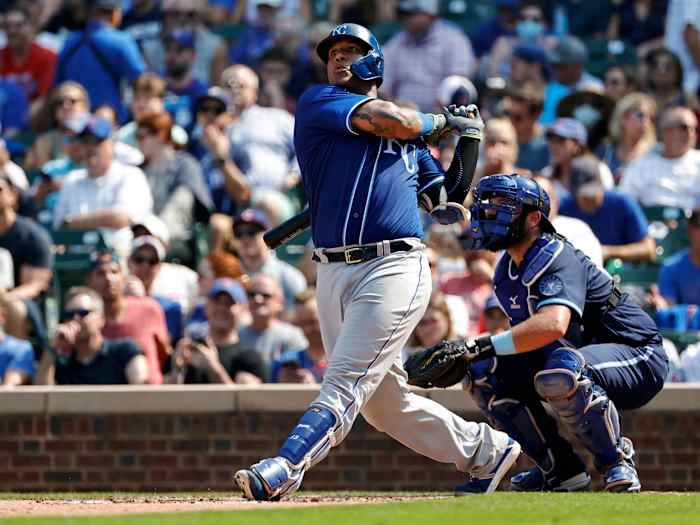 Aug 20, 2021; Chicago, Illinois, USA; Kansas City Royals catcher Salvador Perez (13) hits a solo home run against the Chicago Cubs during the sixth inning at Wrigley Field.